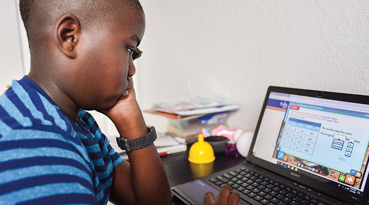 Student on computer working